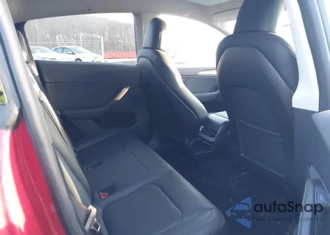 2023 Tesla Model Y Awd/Long Range Dual Motor All-Wheel Drive z USA, uszkodzony, nr VIN 7SAYGDEE0PA185057